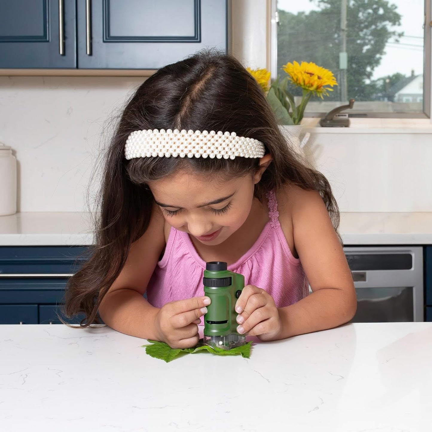 Microscópio compacto